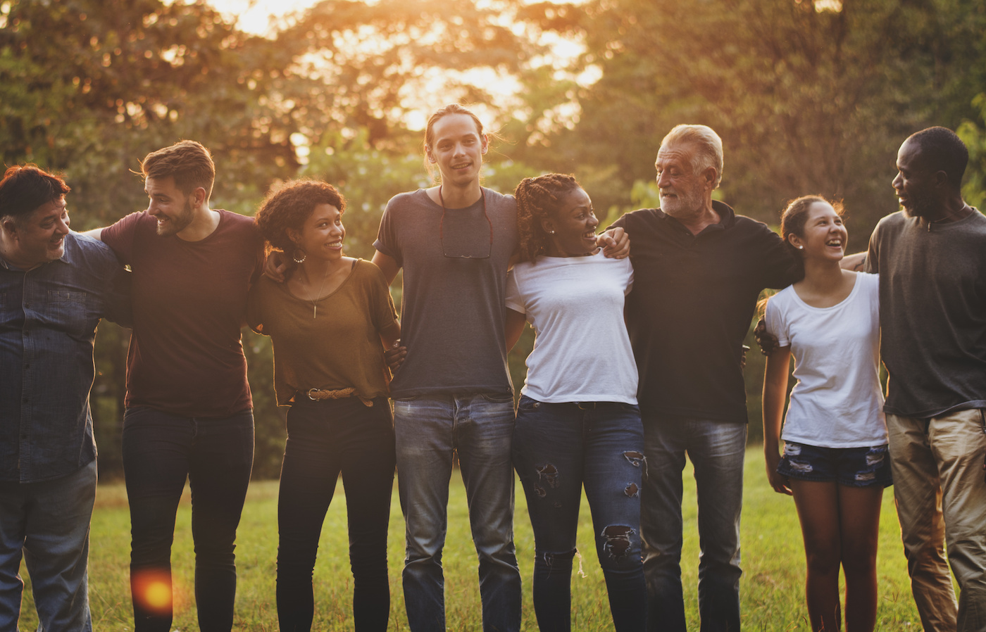Happiness group of people huddle and smiling together
